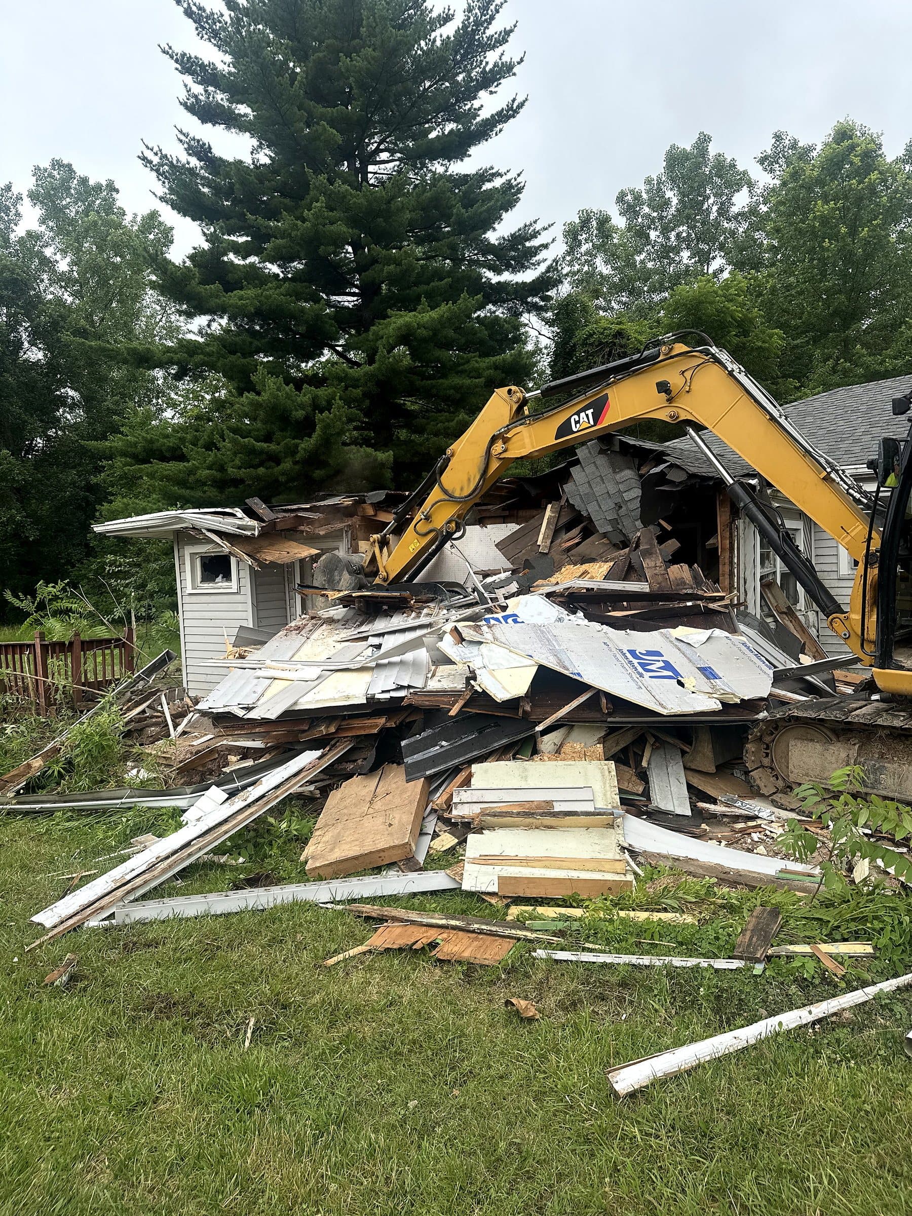 Residential structure demolition in progress